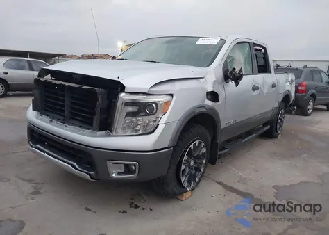 2017 Nissan Titan Pro-4X z USA, uszkodzony, nr VIN 1N6AA1E53HN556956
